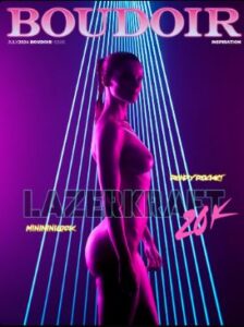 A magazine cover featuring a silhouetted person in a futuristic setting with neon lights, reminiscent of vibrant nightlife. The title "Boudoir" is prominent at the top, with other text like "Lazerkraft 20K" and "Randy Frokket" visible.